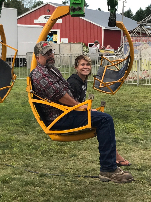 "Never too old to ride at the fair with your dear old Dad"