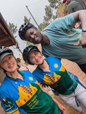 Mary Chamberlin, Victoria Forbes & Fidel Rubaguyamo cycling in Kigali